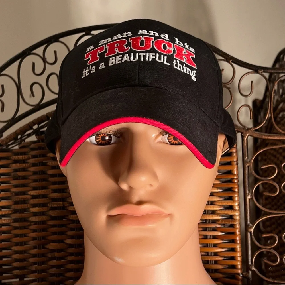 A one size fits all Black ball Cap 